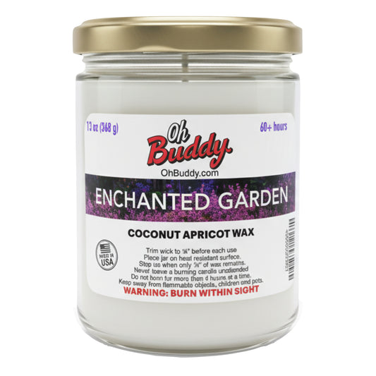 Candle jar labeled 'Oh Buddy Enchanted Garden' with coconut apricot wax on a white background