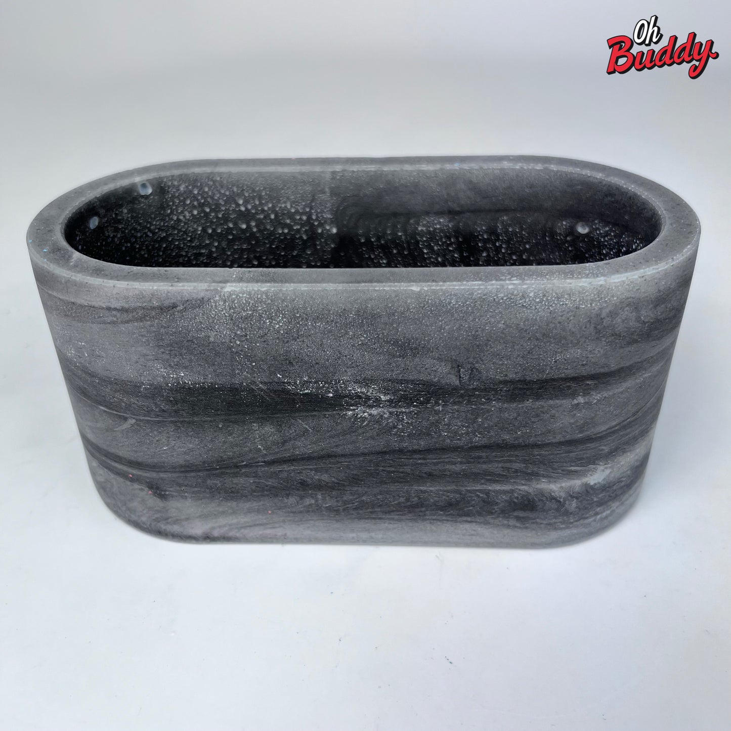 Gray oval concrete planter, gray concrete planter, gray outdoor/indoor planter, cactus planter, succulent planter, gray concrete pot, gray container by OhBuddy
Black oval concrete planter, black concrete planter, black outdoor/indoor planter, black concrete pot, black container by OhBuddy
Grey oval concrete planter, grey concrete planter, grey outdoor/indoor planter, grey concrete pot, grey container by OhBuddy
