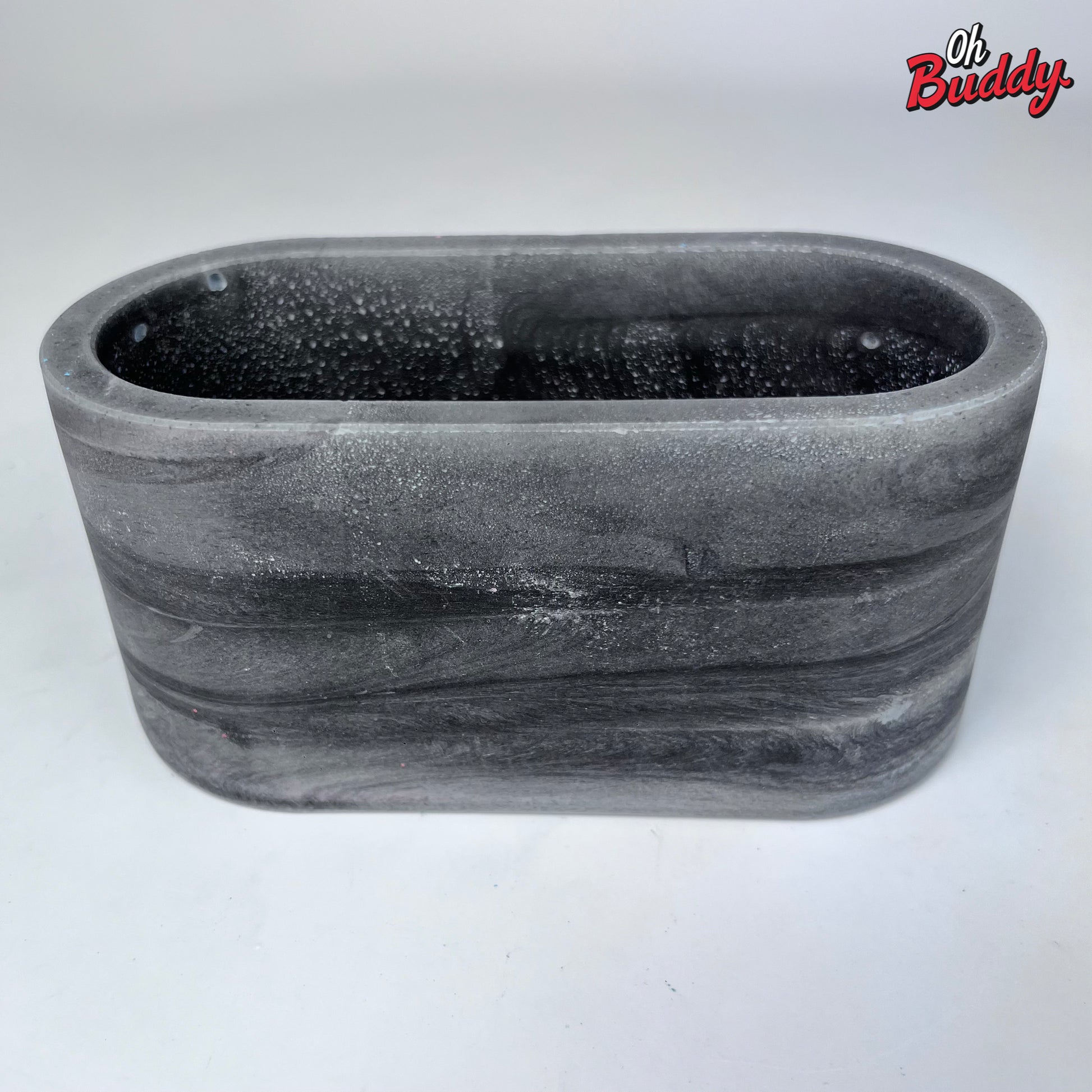 Gray oval concrete planter, gray concrete planter, gray outdoor/indoor planter, cactus planter, succulent planter, gray concrete pot, gray container by OhBuddy
Black oval concrete planter, black concrete planter, black outdoor/indoor planter, black concrete pot, black container by OhBuddy
Grey oval concrete planter, grey concrete planter, grey outdoor/indoor planter, grey concrete pot, grey container by OhBuddy