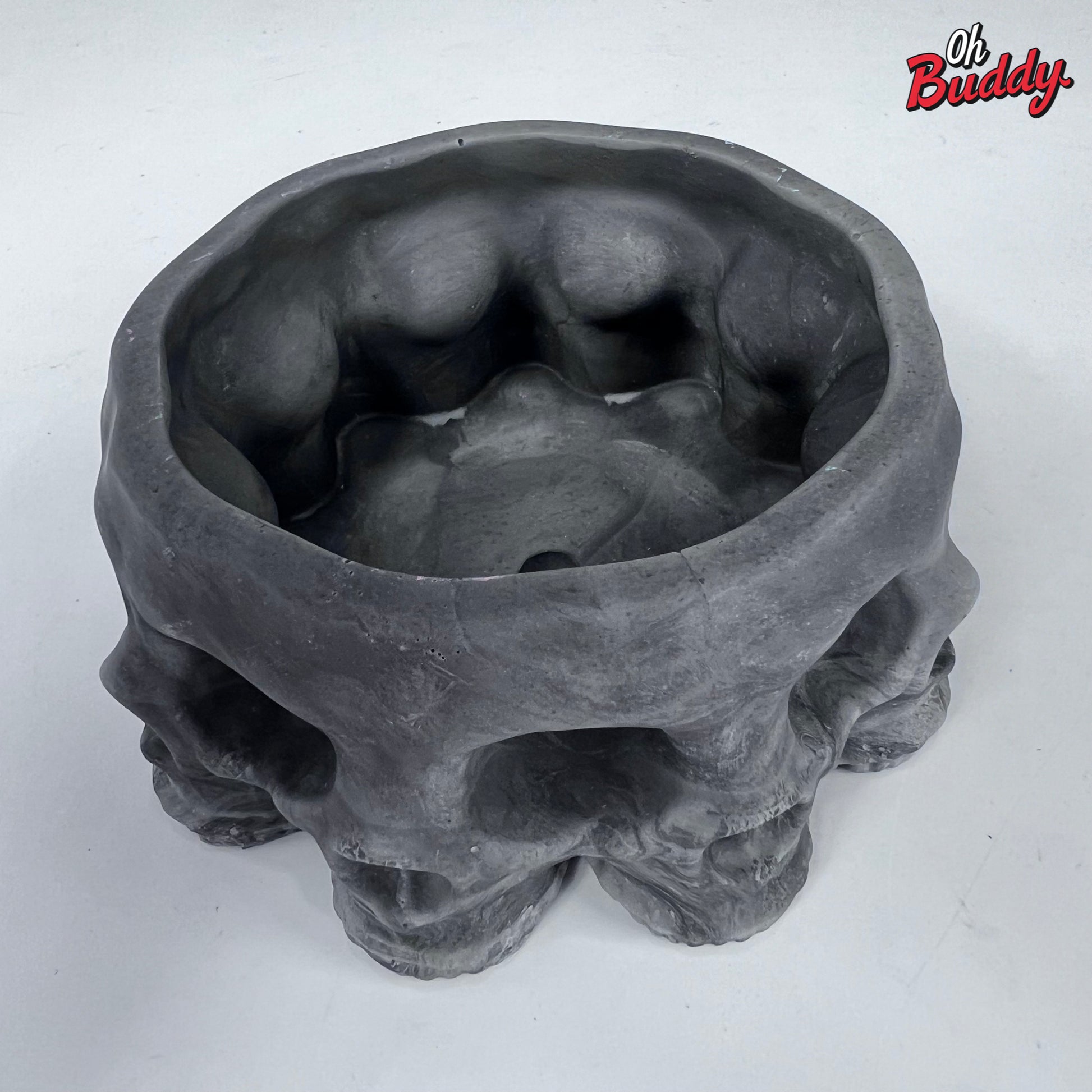 Concrete Multi skull planter in grey with a drainage hole